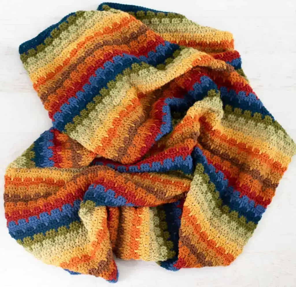 Firesong Throw: A Free Scrap Yarn Crochet Blanket Pattern crochet pattern